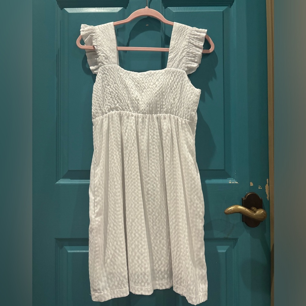 Dillards white dress with ruffled sleeves super cute worn once size small